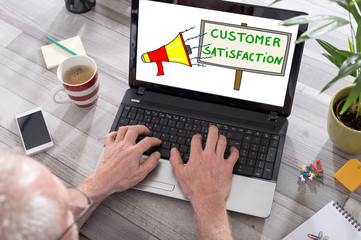 Customer satisfaction concept on a laptop screen