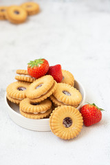 Pastry desert jam cookie with strawbey jam isolated , sweet snack