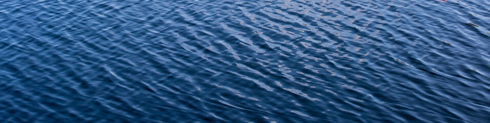 Obraz premium blue water surface with waves background