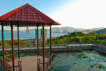 Garden of Dao temple with view of Nha Trang city behind, Vietnam 