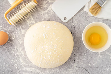 Fresh dough on the table with Ingredients. Copy space.
