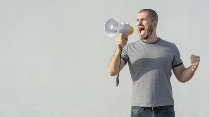 Front view man with megaphone shouting