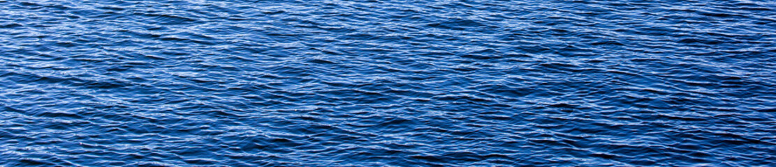 blue water surface with waves background