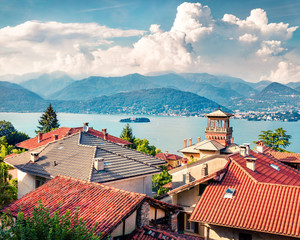 Sunny morning cityscape of Stresa town. Colorful summer view of Maggiore lake with Mottarone...
