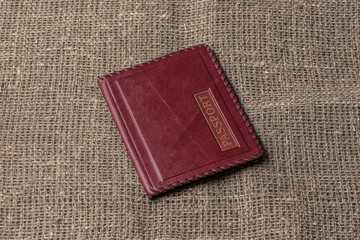Leather case on burlap. Case for passport