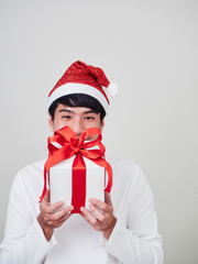 Young man with christmas gift box