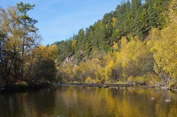 Pictures of the autumn forest, river, hills, sky.
