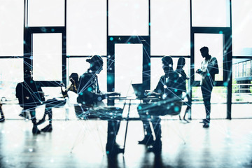 Network background concept with business people silhouette working in the office. Double exposure...