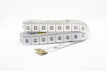 white measuring tape , cen and inc on white Background 