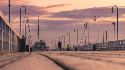 The Sopot Pier in the city of Sopot. The pier is the longest wooden pier in Europe. Beautiful sunrise. October.