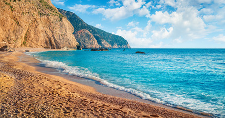 Stunning summer view of Porto Katsiki Beach. Bright morning seascape of Ionian sea. Sunny outdoor scene of Lefkada Island, Greece, Europe. Beauty of nature concept background.
