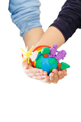 Bola del mundo en plastilina manos