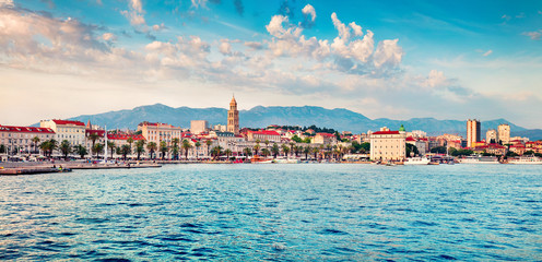 Colorful evening panorama of Split city with Diocletian palace. Stunning summer seascape of...