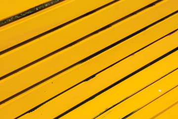 Yellow wooden bench