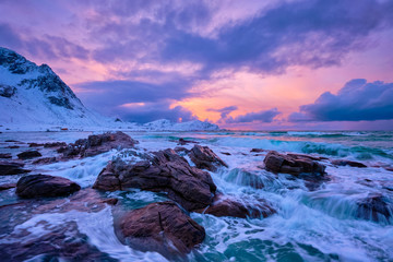 Fototapeta na wymiar Norwegian Sea waves on rocky coast of Lofoten islands, Norway