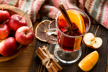 Mulled wine with citrus fruits and spices. Winter grog with orange, cinnamon and anise