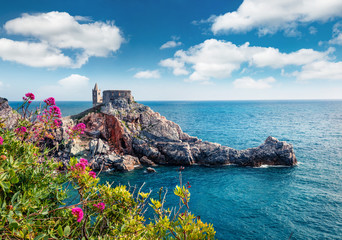 Attractive morning view of Saint Peter Church in Portovenere town. Picturesque spring seascape of Mediterranean sea, Liguria, province of La Spezia, Italy, Europe. Traveling concept background.