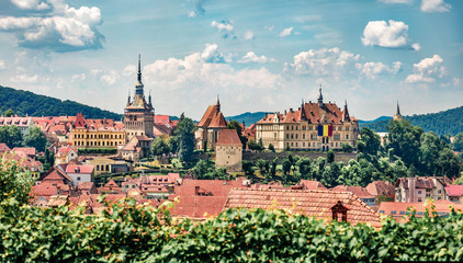 Obraz premium Panoramic morning cityscape of Sighisoara. Splendid summer view of medieval town of Transylvania, Romania, Europe. Traveling concept background.