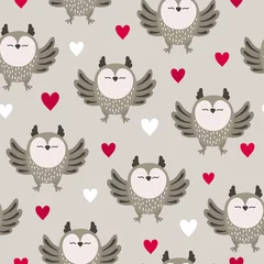 Muurstickers Seamless cute cartoon owls pattern with hearts. © Afanasia