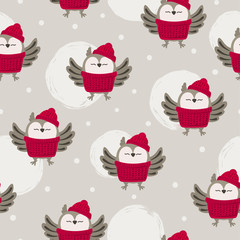 Seamless cute cartoon owls pattern. Winter vector illustration.