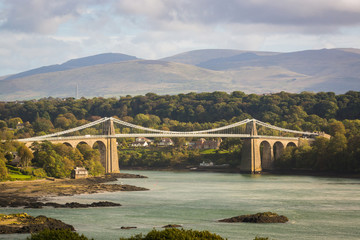 The Menai suspension bridge designed by Thomas Telford and completed in 1826 to connect the...
