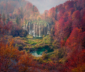 Aerial morning view of pure water waterfall in Plitvice National Park. Spectacular autumn scene of Croatia, Europe. Beauty of nature concept background.