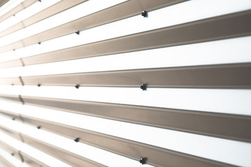 White striped transparent surface smoothly becoming blurry on the left