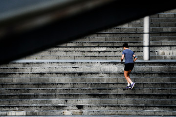 woman running on the stairs