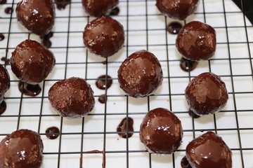 Fresh chocolate balls, closeup in kitchen