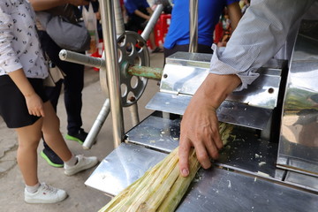 Sugar cane drink in vietnam.