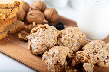Crispy cookies with walnut and tahini and glass of milk