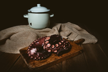 Octopus. Seafood in the restaurant. Octopus is prepared in the restaurant on the table.