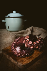 Octopus. Seafood in the restaurant. Octopus is prepared in the restaurant on the table.