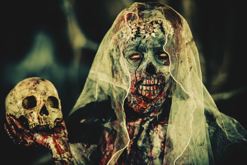 female bloody zombie