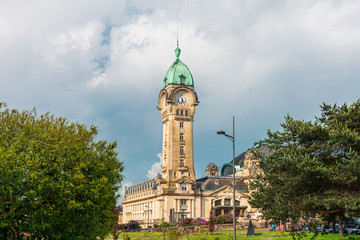 Obraz premium LIMOGES, FRANCE - May 8, 2018 : Main railway station of Limoges in Limoges, France.Cathedral in Limoges, France
