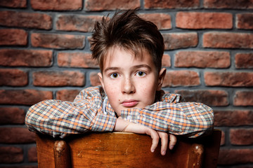 cute guy sitting on chair