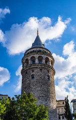 Fototapeta na wymiar Istanbul, Turkey: the Galata Tower, a medieval stone tower built by Genoese in 1348 in the Karakoy quarter, a cone-capped cylinder dominating the skyline and offering panoramic vista of the city