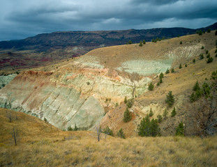 Breathtaking views of the grey-blue badlands and the John Day river valley from the Blue Basin Overlook Trail at the John Day Fossil Beds in Kimberly Oregon