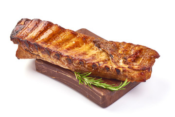 Roasted homemade pork ribs, Delicious barbecued hot ribs, isolated on white background