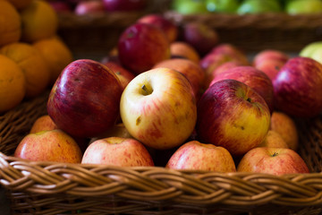Naklejka na ściany i meble appetizing apples on counter in market