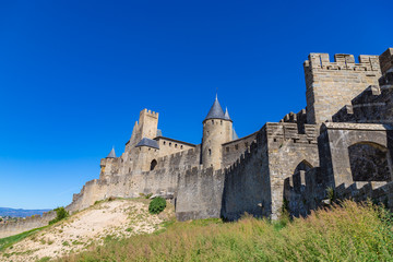 Obraz premium The medieval fortress and walled city of Carcassone in southwest France. Founded by the Visigoths in the 5th century, it was restored in 1853 and is now a UNESCO World Heritage Site