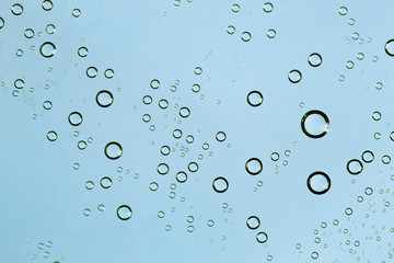 Water Drops. Bubbles close-up. The texture of gel cream. Oxygen bubbles in clear blue water, close-up. Mineral water. Water enriched with oxygen.