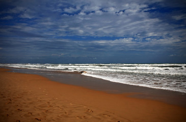 Fototapeta na wymiar Beach, sea and waves in summer