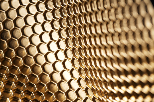 Abstract hexagon background. Hexagons industrial background. Golden bee honeycombs. - Powered by Adobe