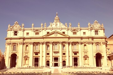 Fototapeta na wymiar Saint Peter's Basilica in Vatican. Vintage filtered colors.