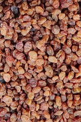 Background of brown raisins close-up