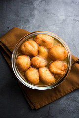 Kanji Vada / wada is a popular Rajasthani detoxifying dish consumed after over eating of sweets in Indian festival season. served in transparent Bowl or glass