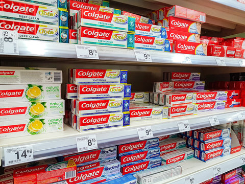 Nowy Sacz, Poland - July 06, 2017: Various Colgate toothpaste products for sale in the Carrefour Hypermarket. Colgate is a brand of toothpaste produced by Colgate-Palmolive Company.