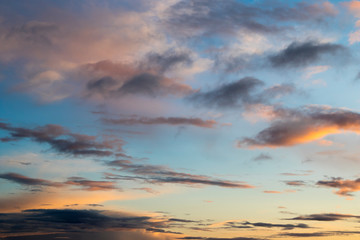 Naklejka na ściany i meble Clouds at sunset, amazing sky, nature background