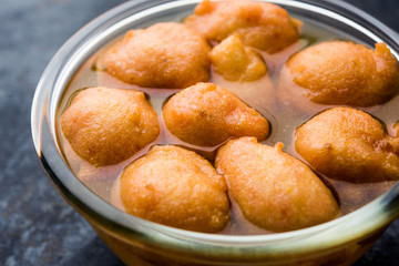 Kanji Vada / wada is a popular Rajasthani detoxifying dish consumed after over eating of sweets in Indian festival season. served in transparent Bowl or glass